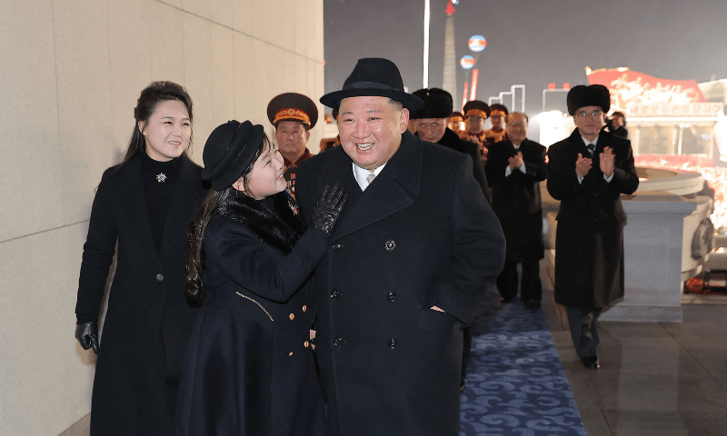 This picture taken on February 8 and released by North Korea’s official Korean Central News Agency (KCNA) on February 9 shows North Korea’s leader Kim Jong Un (R), his daughter presumed to be named Ju Ae (C) and wife Ri Sol Ju (L) attending a military parade celebrating the 75th anniversary of the founding of the Korean People’s Army in Kim Il Sung Square in Pyongyang. — AFP