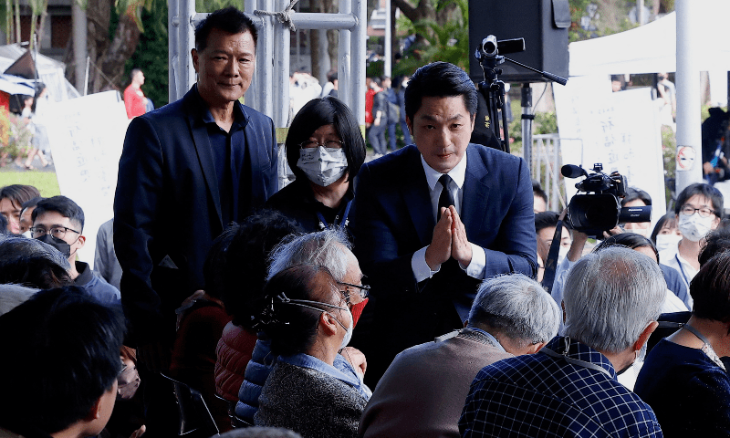 Taipei Mayor Chiang Wan-an greets the victims’ relatives during a ceremony marking the 76th anniversary of a violently suppressed anti-government uprising known as the 228 incident at 228 Peace Memorial Park in Taipei, Taiwan, February 28, 2023. — Reuters