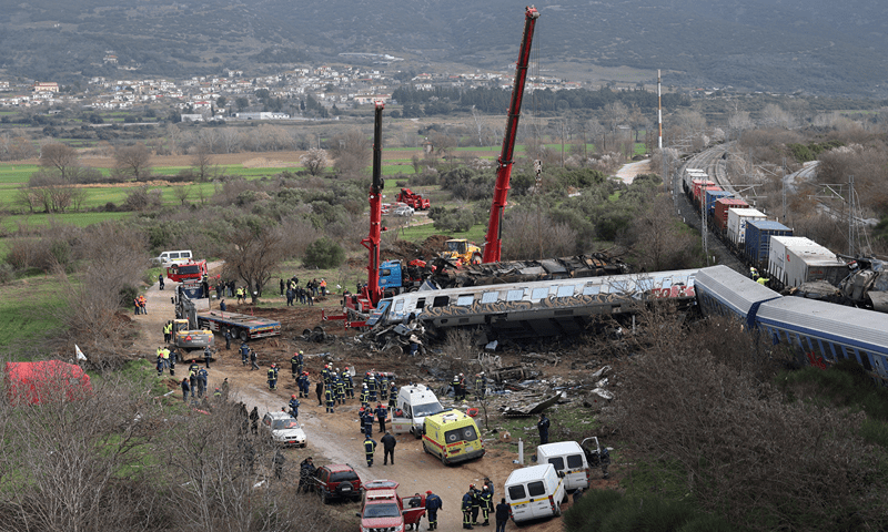 Rescuers operate at the site of a crash, where two trains collided, near the city of Larissa, Greece, March 1, 2023.—Reuters/Alexandros Avramidis